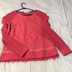 red/pink sweater